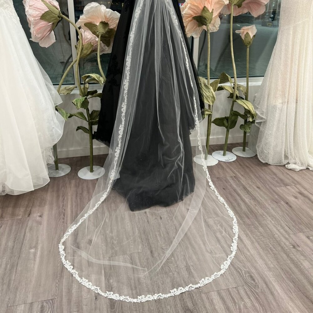 Pearl and rhinestone lace catheral veil